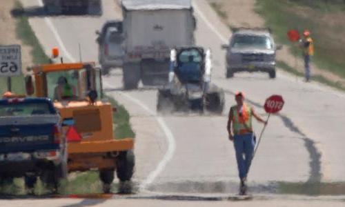 worker in hot roadway